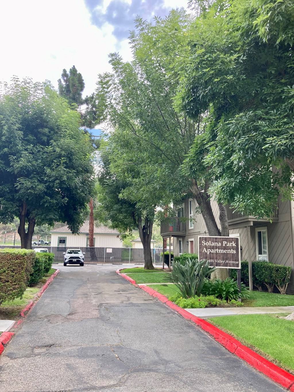 Front entry to Solana Park Apartments in Solana Beach, California.