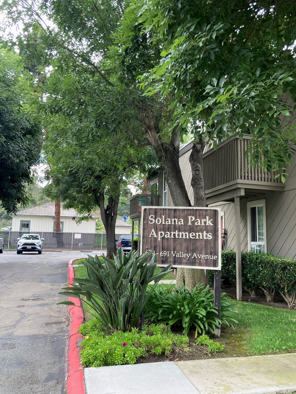 Front entry sign at Solana Park Apartments in Solana Beach, California.