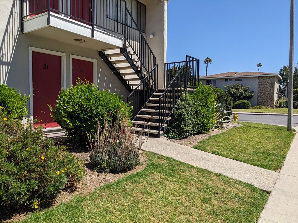 Stairs to upper units and landscaping at Steckel Apartments in Santa Paula, California.