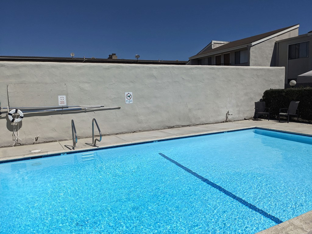 Large sparkling swimming pool at the Steckel Apartments in Santa Paula, California.