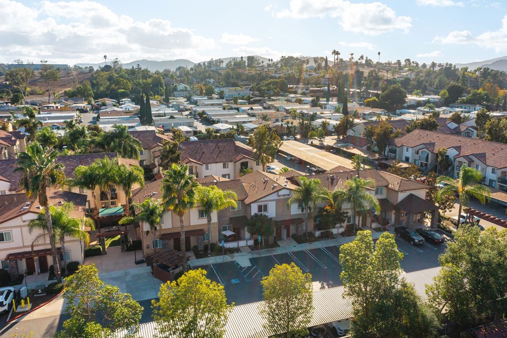Arial view of parking and townhomes at The Nines Townhomes in Escondido, California.