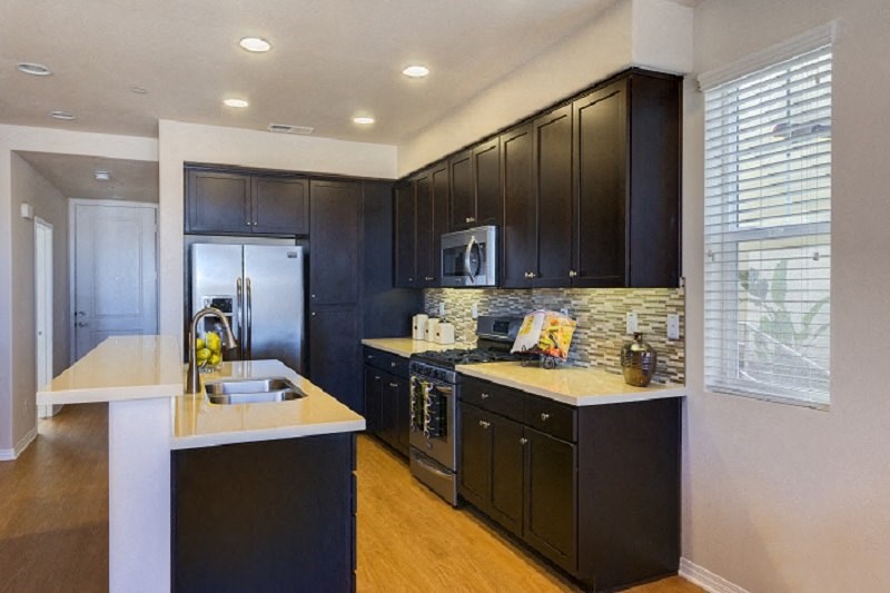 Kitchen in Torrey unit at Costa Pointe Luxury Townhomes in Carlsbad, California.