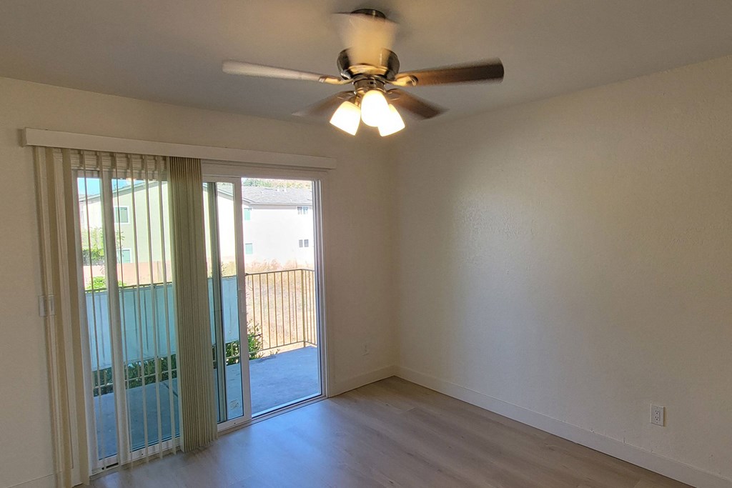Bedroom two balcony in unit 17 at The Willows at Washington apartments in El Cajon, California.