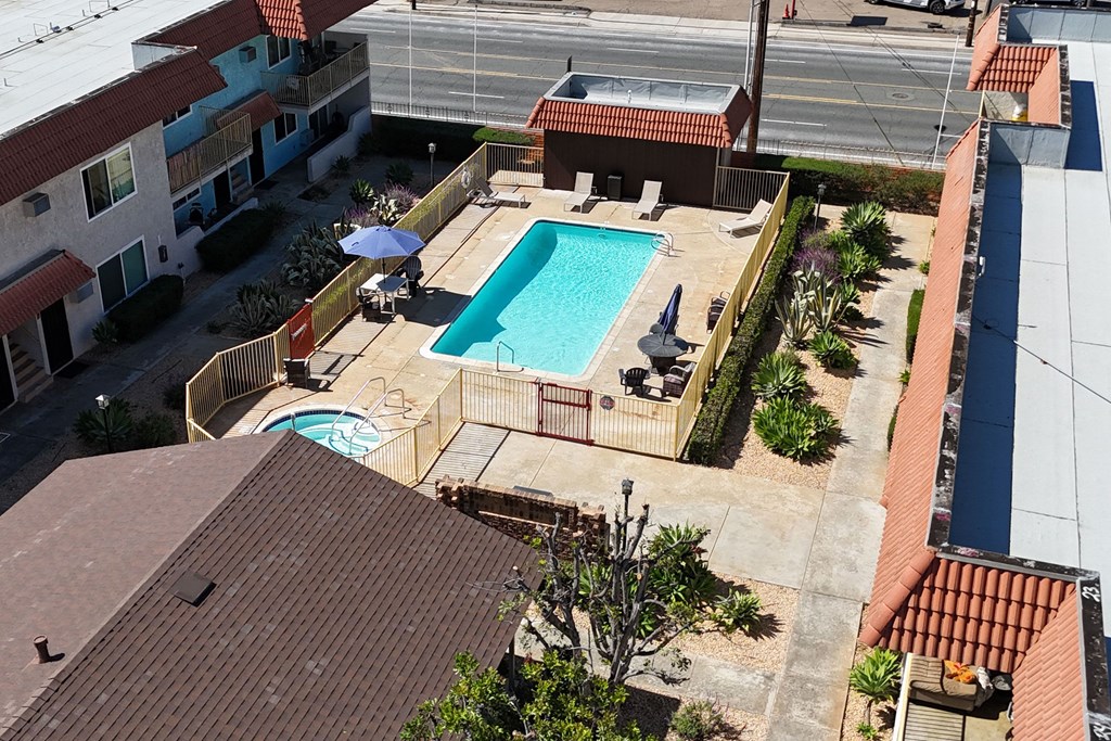 Aerial view of swimming pool and hot tub at The Willows at Washington Apartments in El Cajon, California.