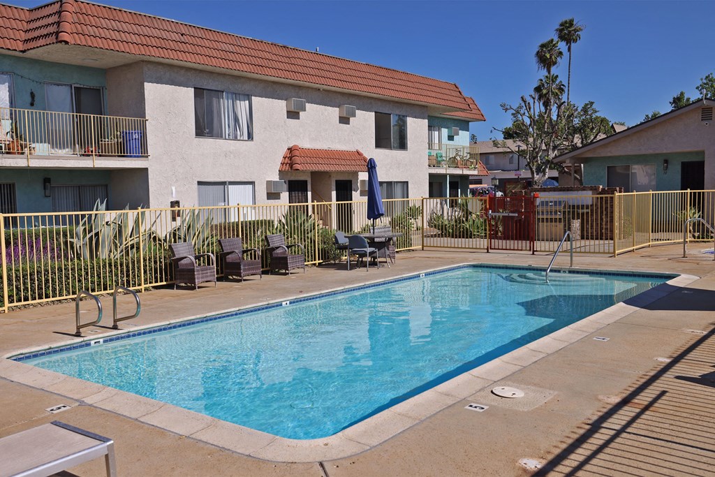 Swimming pool in central courtyard at The Willows at Washington apartments in El Cajon, California.