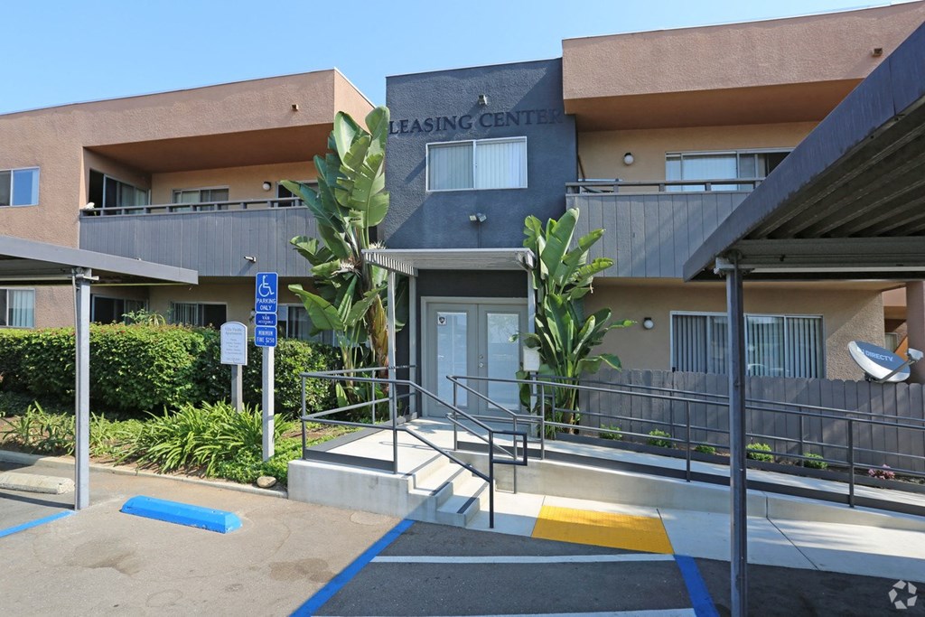 Leasing office enterance from parking lot at Villa Pacific Apartments in Oceanside, California.