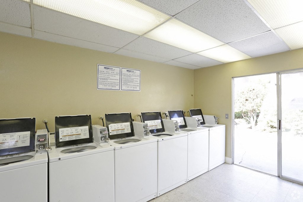 Laundry facility at Villa Pacific Apartments in Oceanside, California.