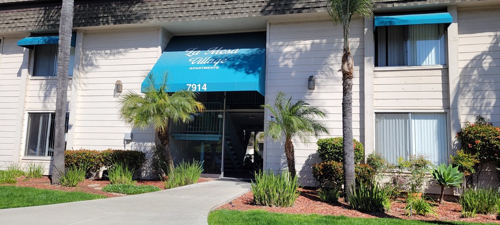 La Mesa Village apartments enterance from sidewalk on La Mesa Blvd.
