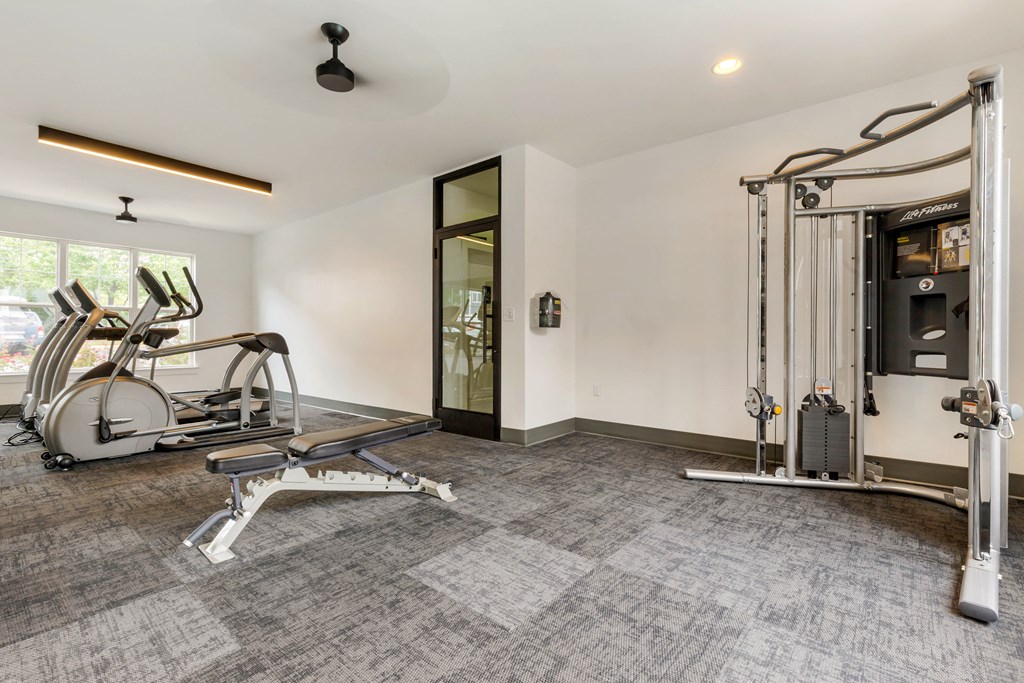 the gym at the whispering winds apartments in pearland, tx