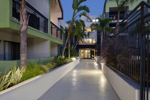 a walkway in between buildings