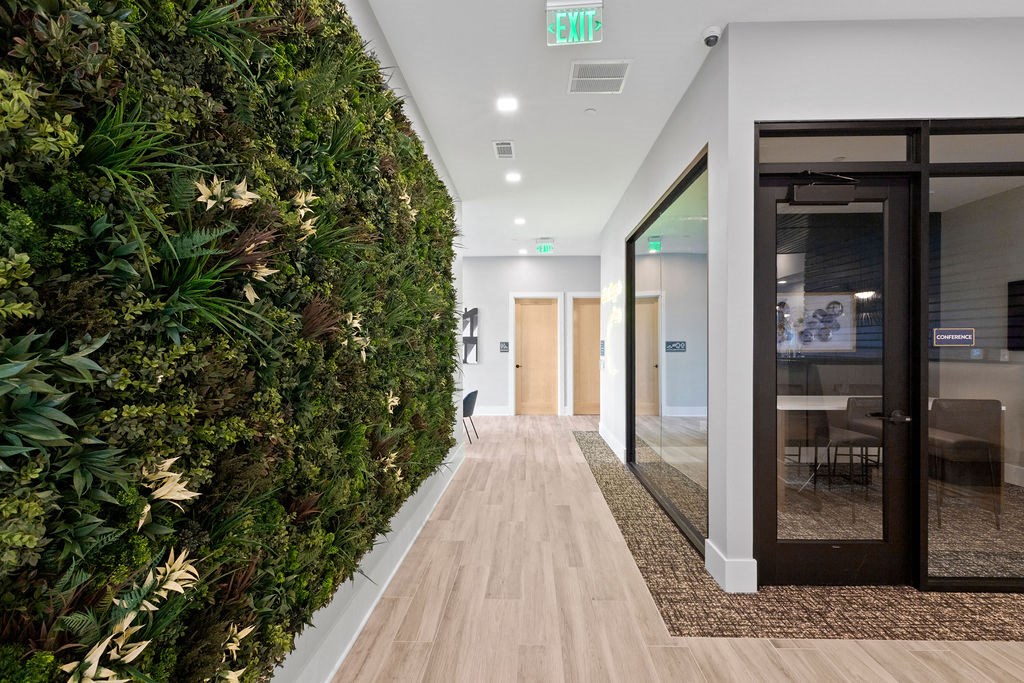 Green Wall with Plats and Conference Rooms