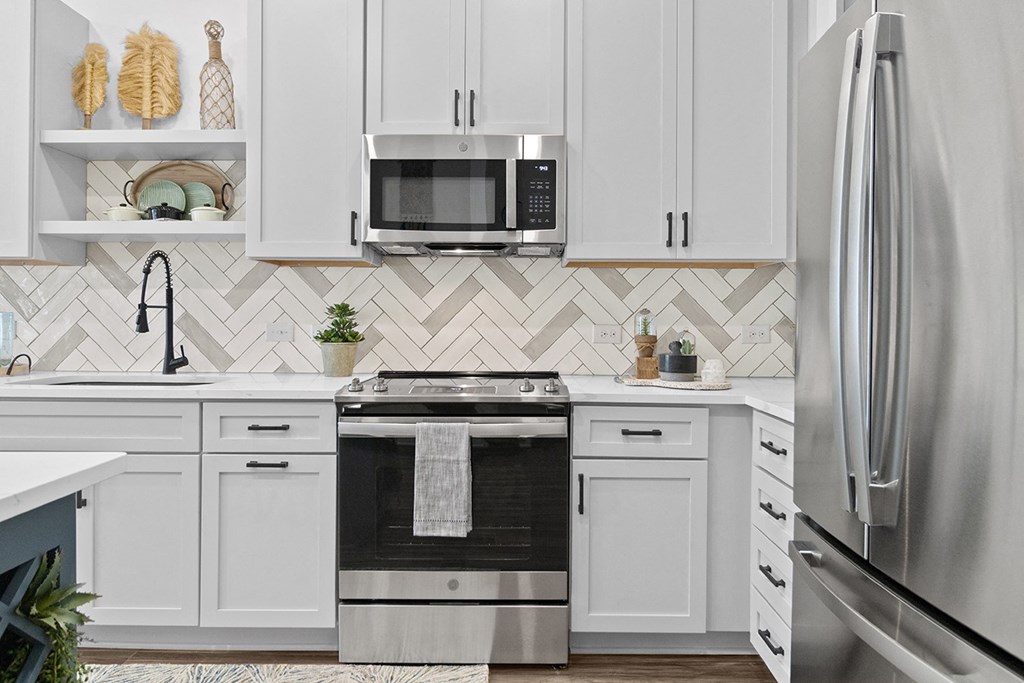 kitchen with herringbone backsplash