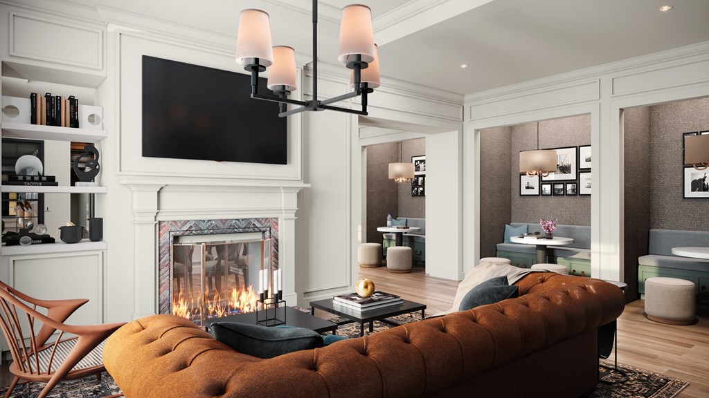 a living room filled with furniture and a fire place