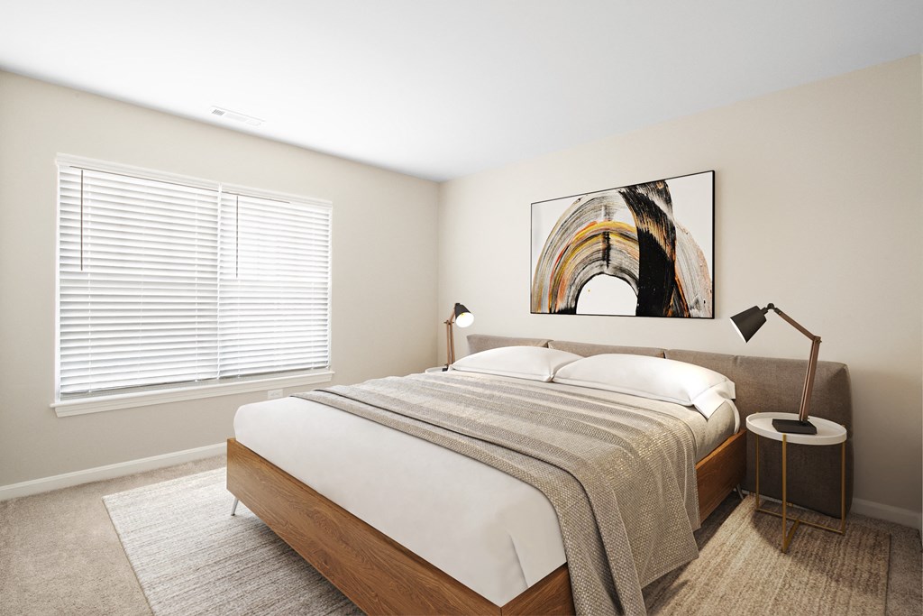 a bedroom with a large bed and a large painting on the wall