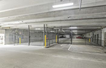 the inside of a parking garage with open doors