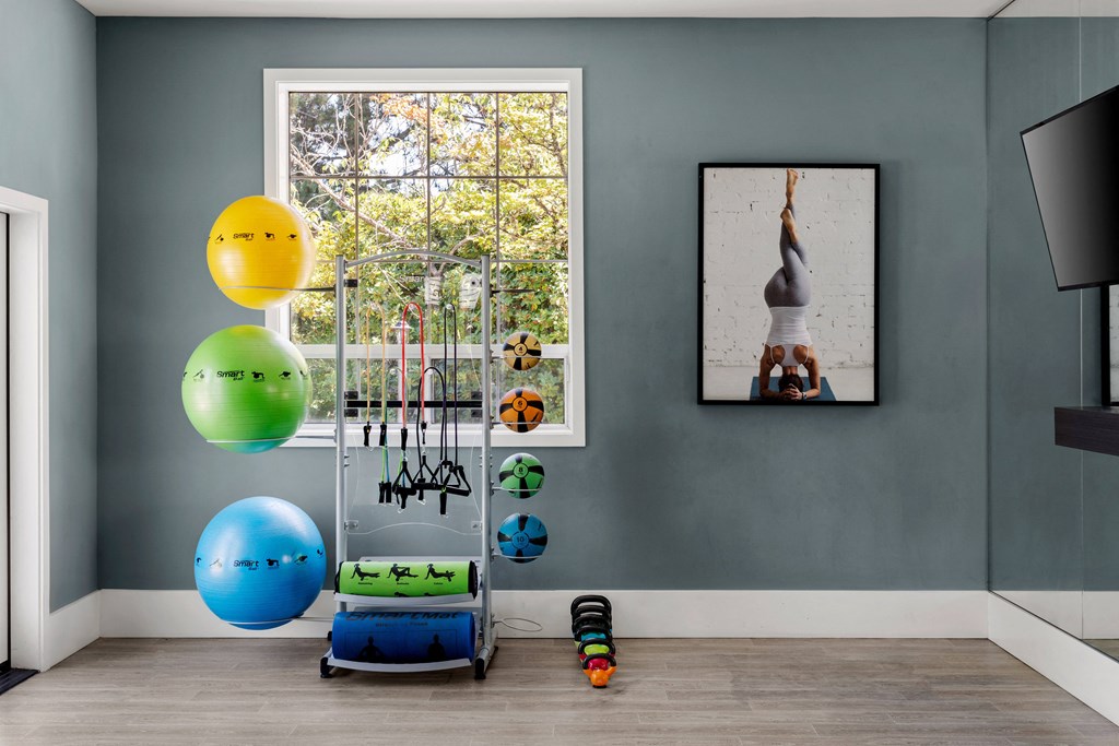 a living room with a bunch of balloons and toys in it