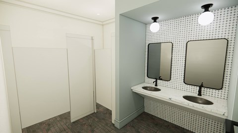 A bathroom with a white sink and mirror.