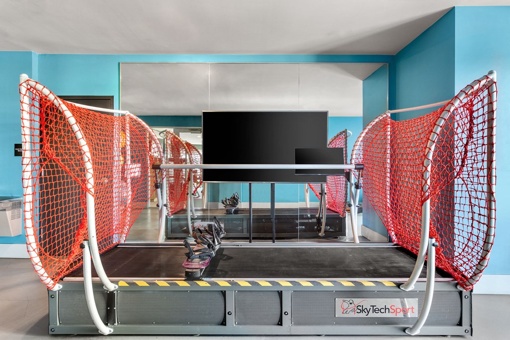 a room with a net and a television in it