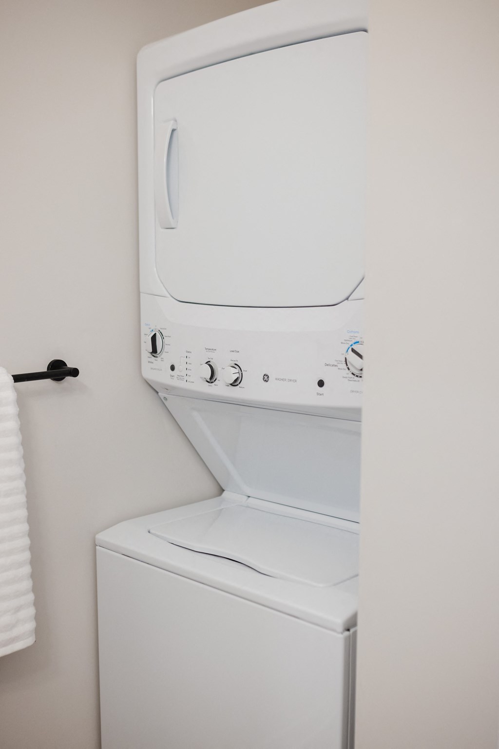 a small laundry room with a washer and dryer in it