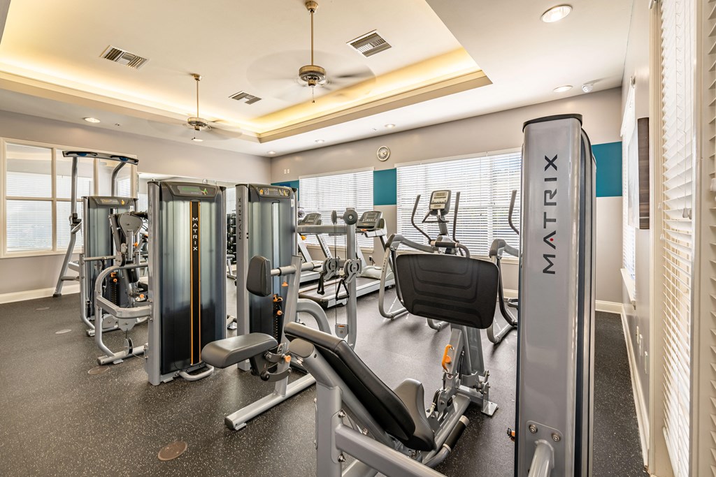Fitness center with a variety of equipment.