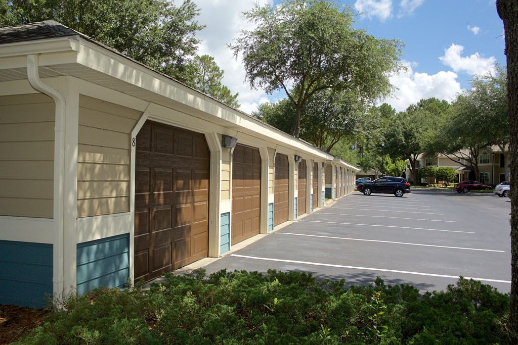 a row of garage doors on the side of a building