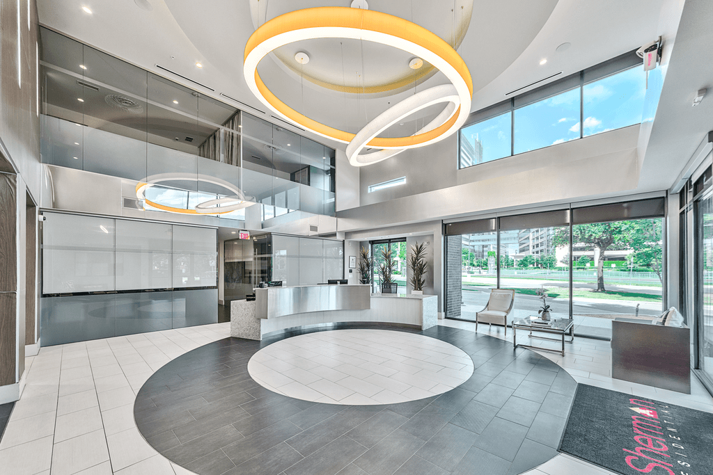 A modern interior space with a large circular area in the center.