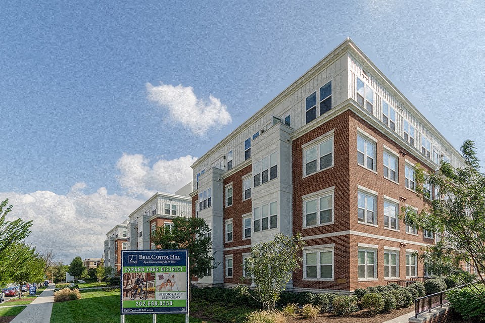 an image of a building with a sign in front of it