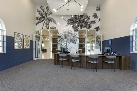 a large office space with a large desk and chairs