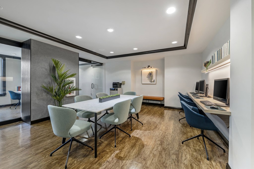 a room filled with furniture and a large window