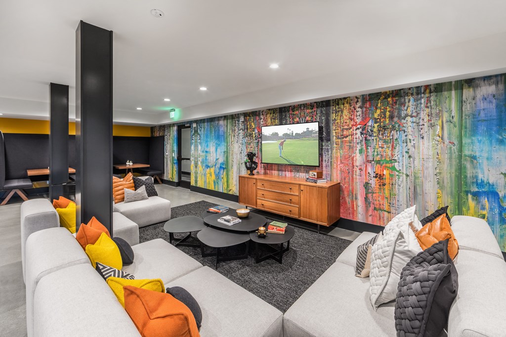 resident lounge with seating and tv