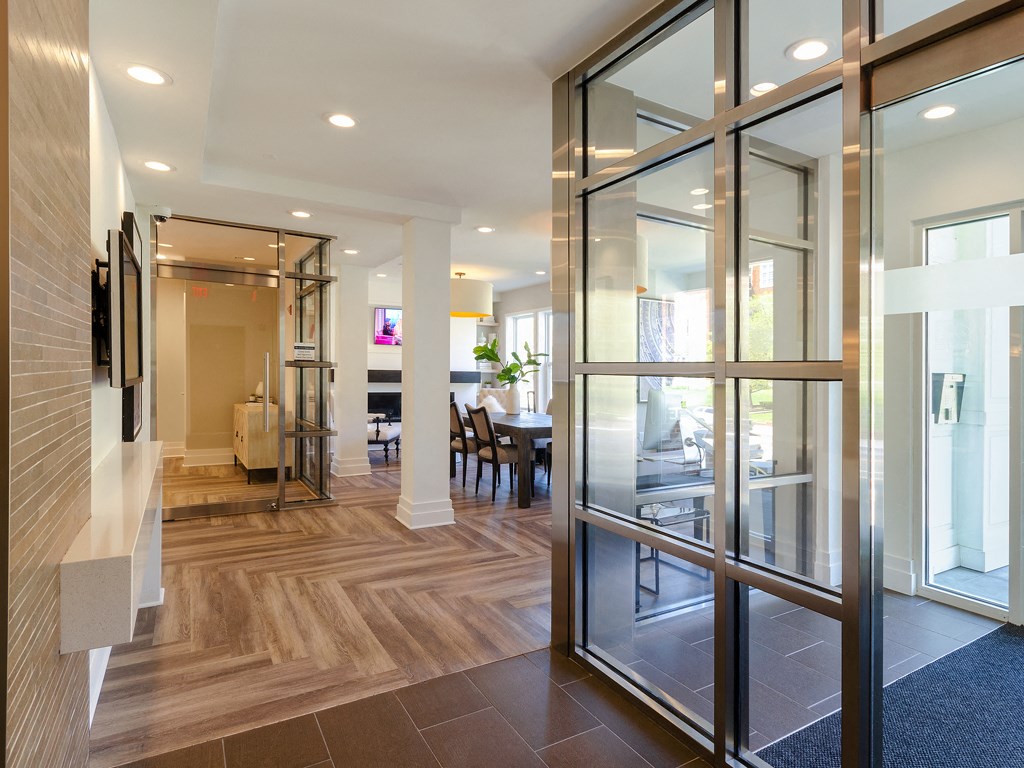 a view of the dining room from the living room of a modern house