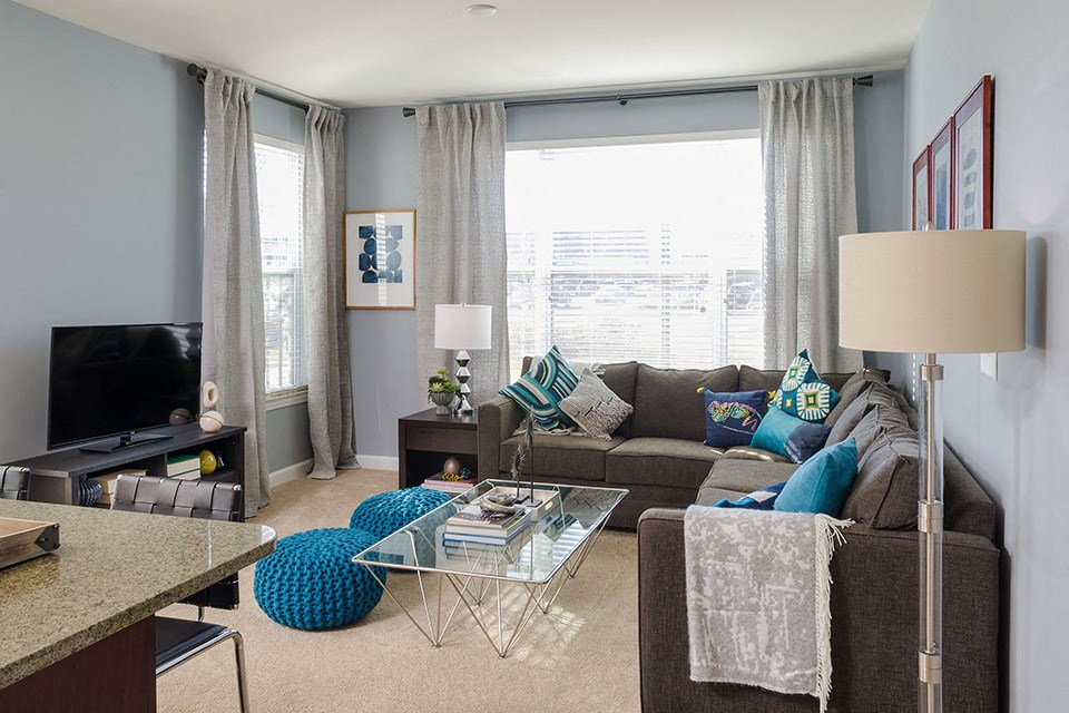 a living room with a couch and a tv