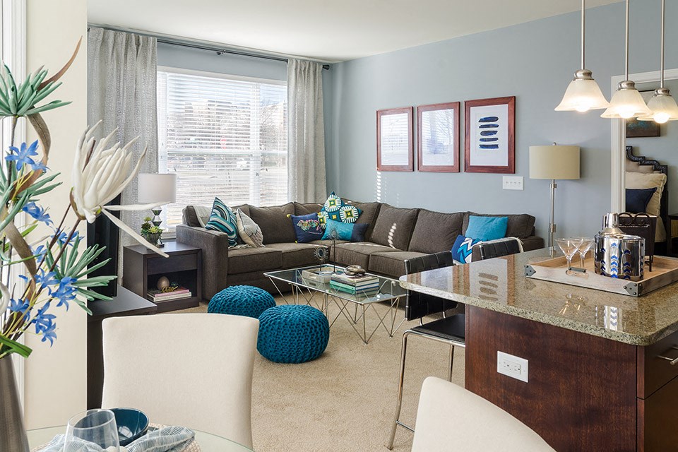 a living room with a couch and a table