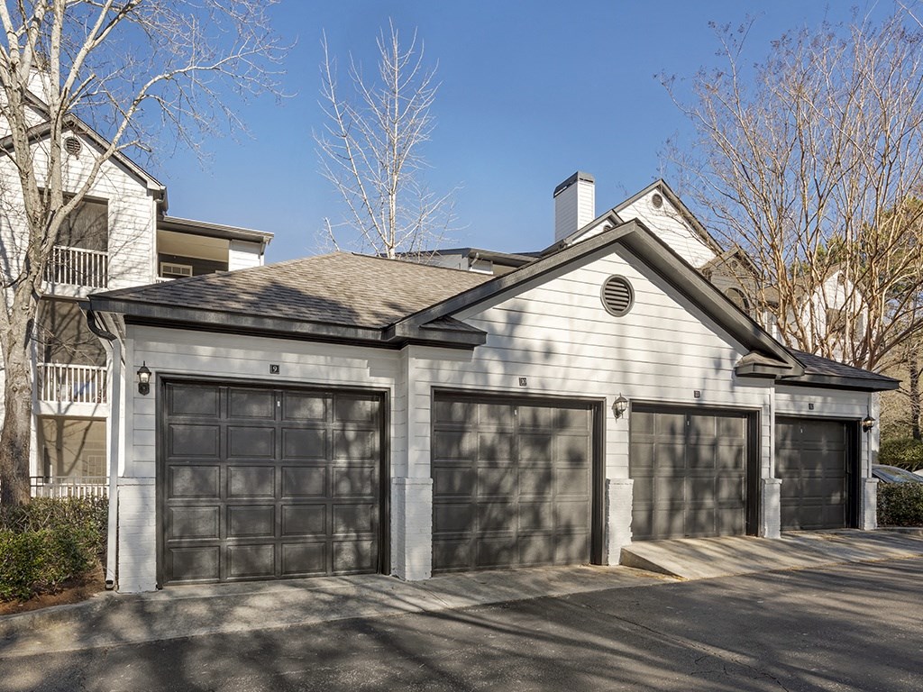 a house with a garage with three garages