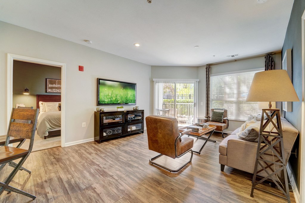 a living room with a couch and a tv
