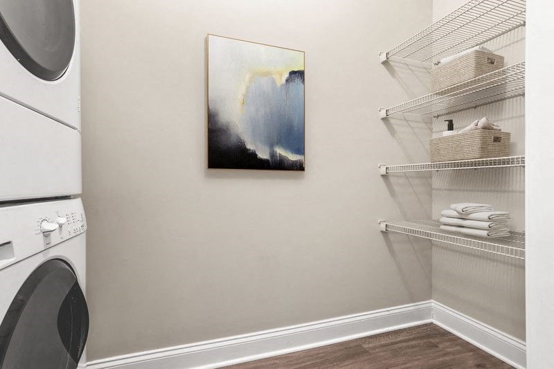 a laundry room with a washer and dryer