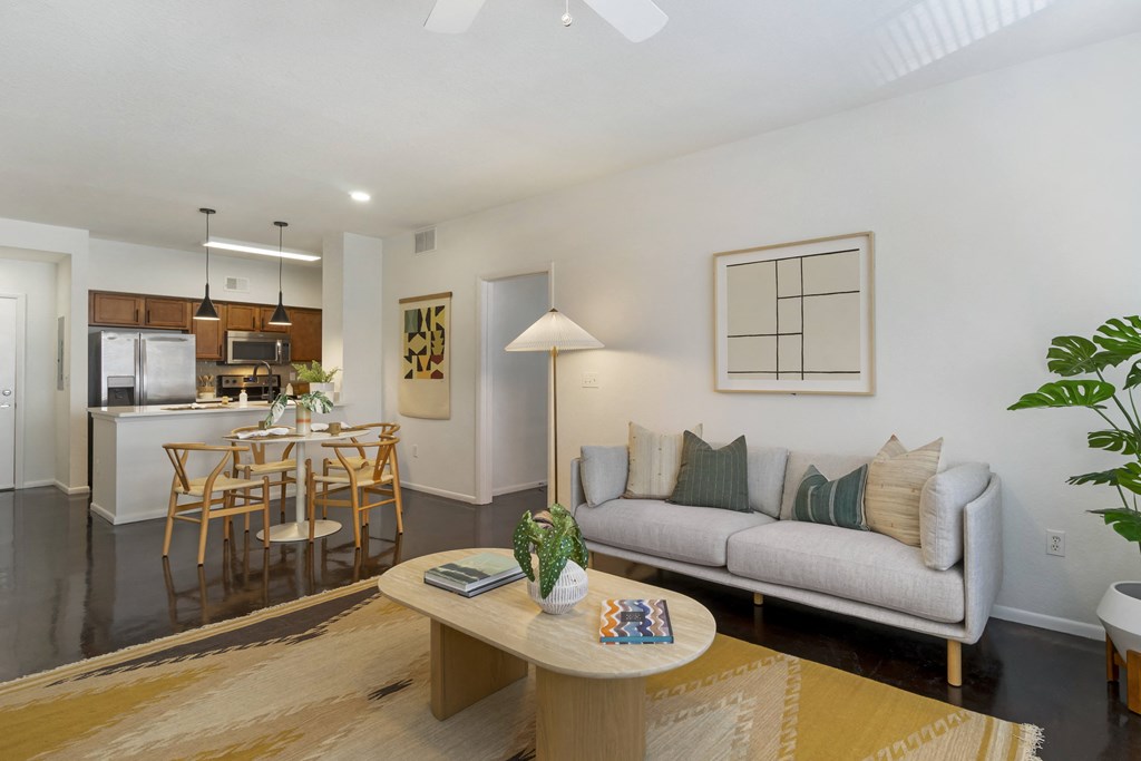 a living room with a couch and a table