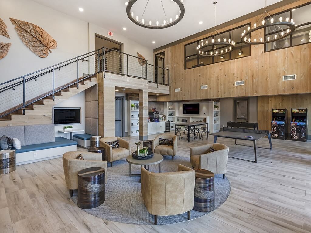 a clubhouse with a ping pong table and shuffleboard