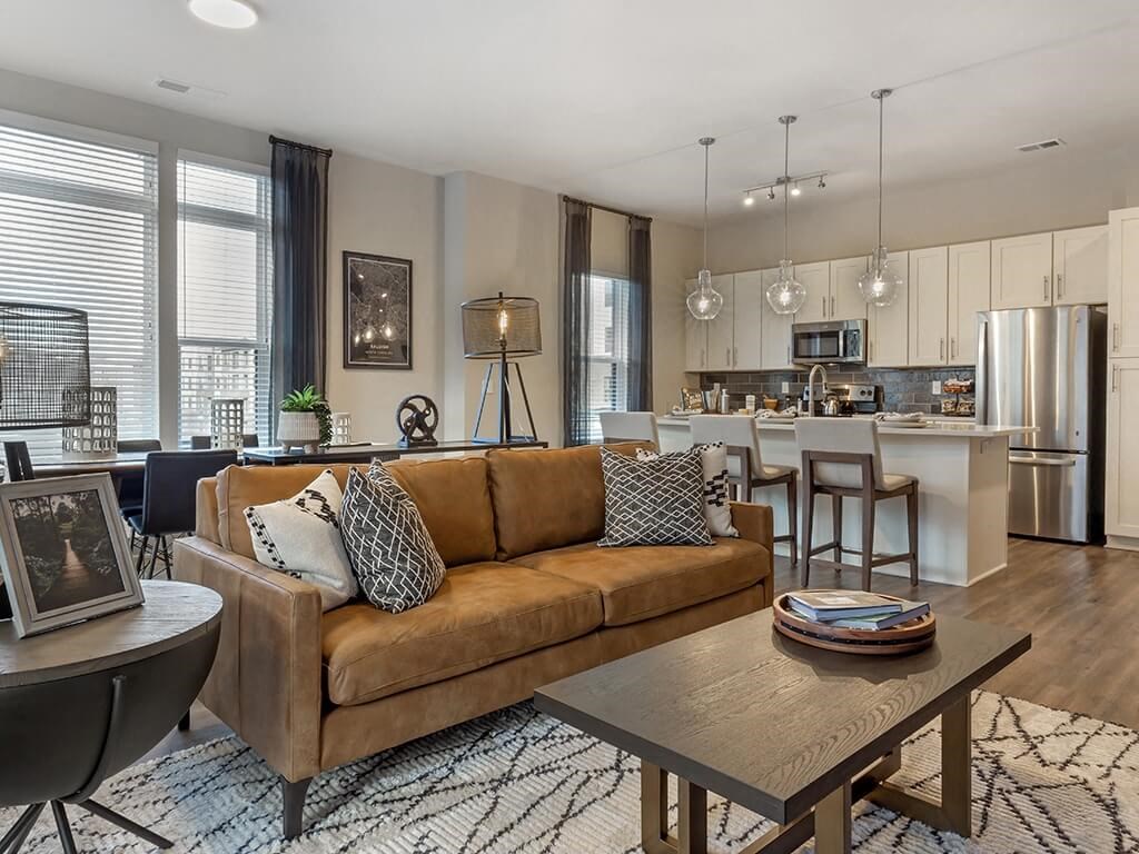 a living room with a couch and a table