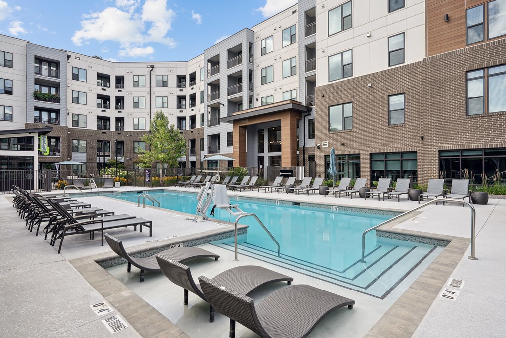 our apartments have a large pool and lounge chairs