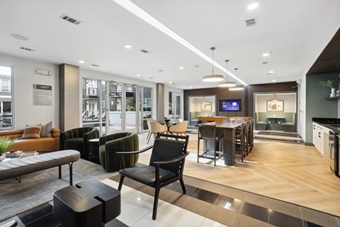 a living room with a dining room and a kitchen