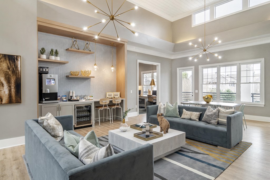 a living room with couches and a coffee table