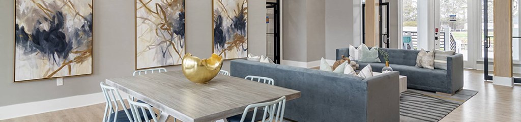 a dining room with a table and chairs