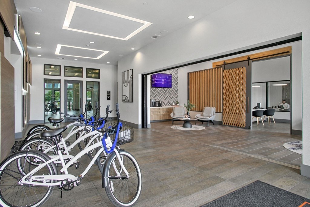 a group of bikes parked in front of a building