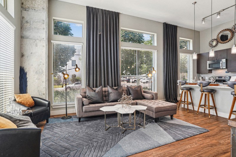 a living room with a couch and a table