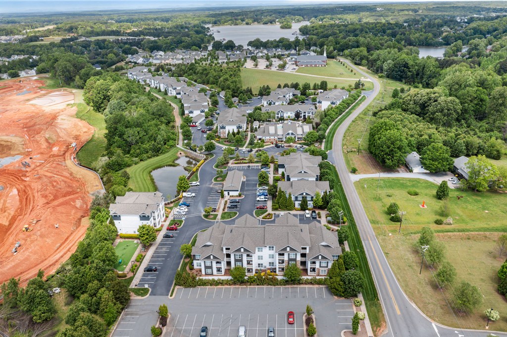 arial view of a subdivision with a river in the background