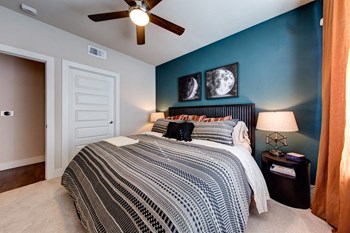 Bell Lakeshore Bedroom with Bed and accent wall - Photo Gallery 8