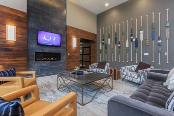 Modern Clubhouse with fireplace, TV and seating - Photo Gallery 17