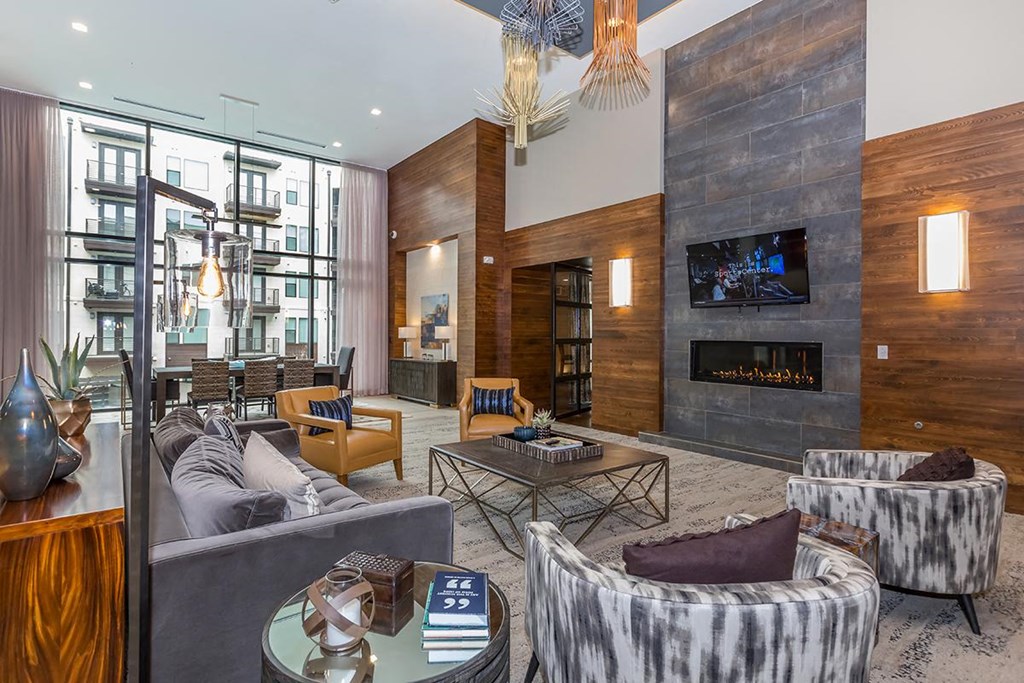 Modern Clubhouse with fireplace, TV and seating