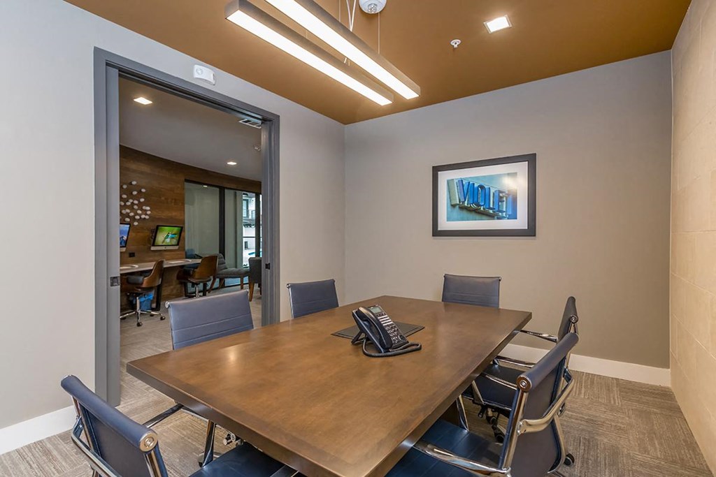 Conference room with screen and large table